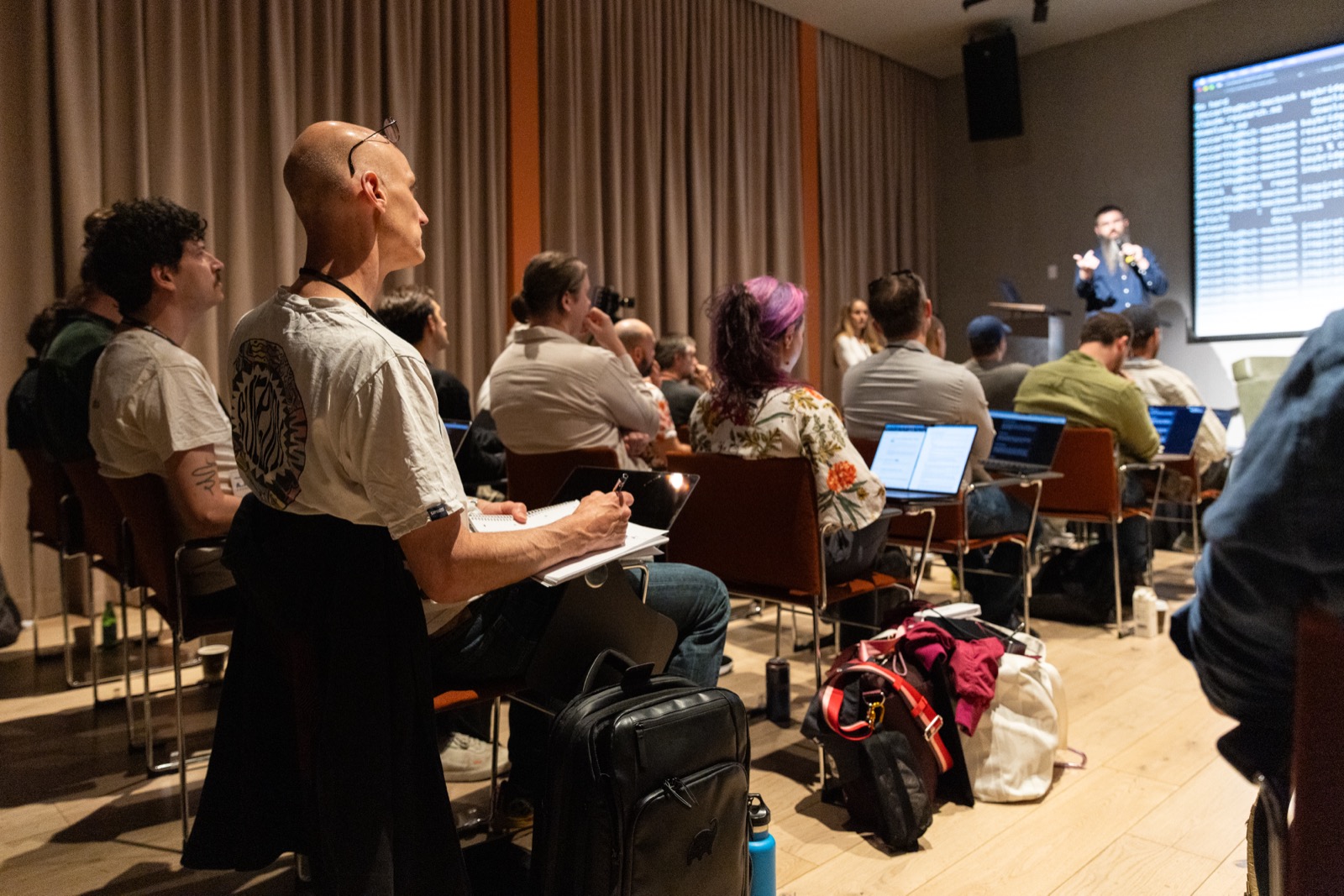 Audience building along during a live demo at V1