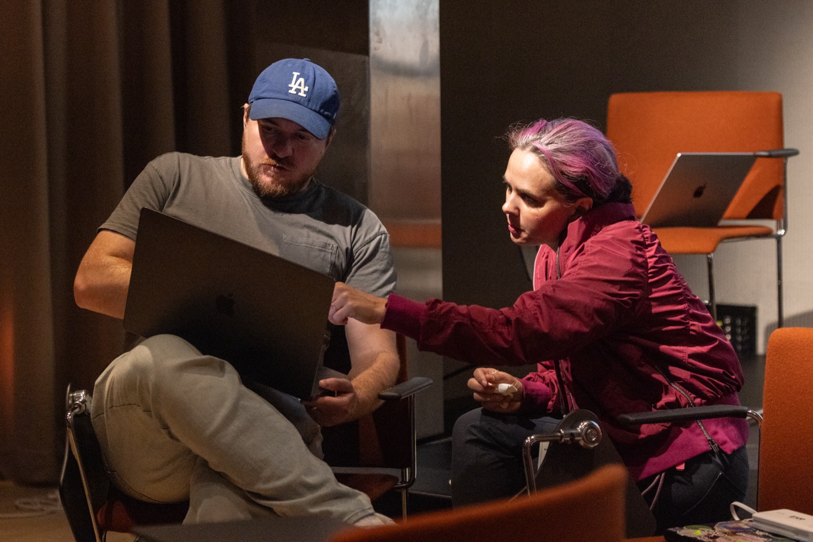 Two attendees debugging together at V1